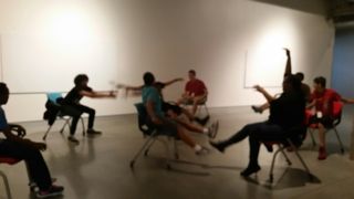 On a field trip to Kaneko, students invented their own game with rolling chairs